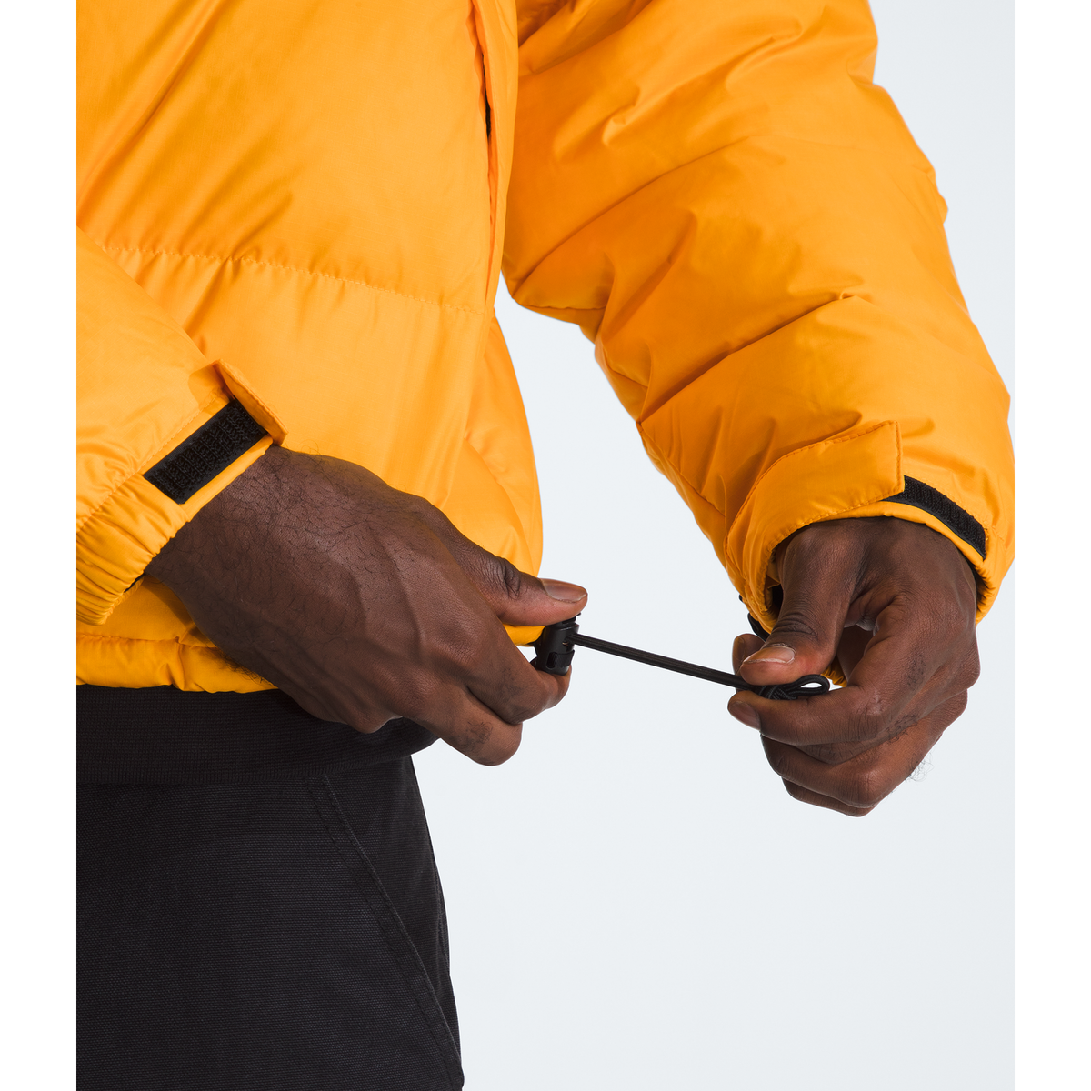 The North Face Men's 1996 Retro Nuptse Jacket in Summit Gold/TNF Black/Recycled Down