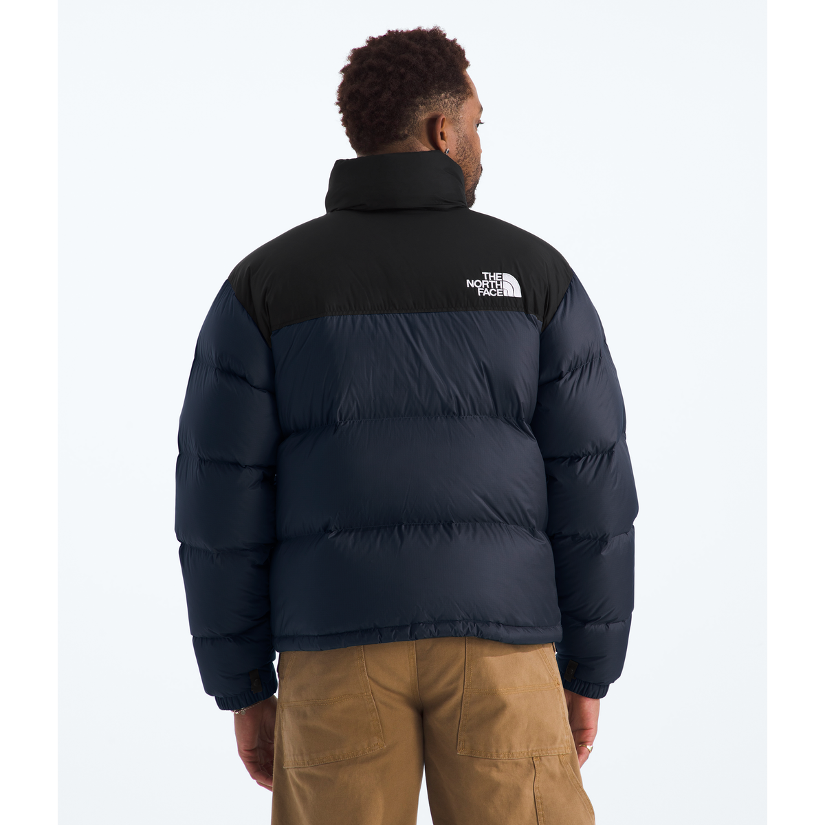 The North Face Men's 1996 Retro Nuptse Jacket in Summit Navy/TNF Black