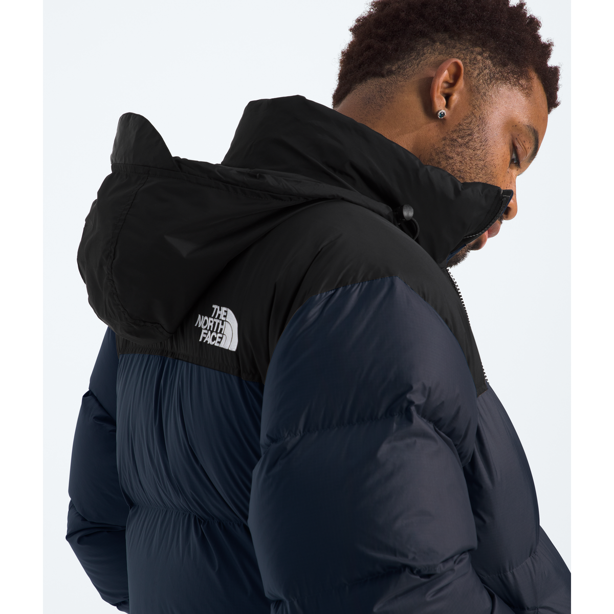 The North Face Men's 1996 Retro Nuptse Jacket in Summit Navy/TNF Black