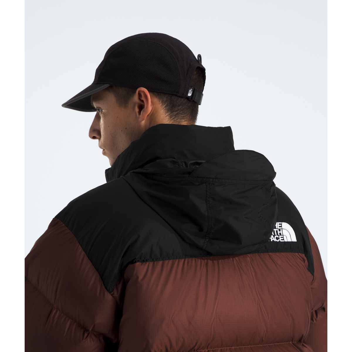 The North Face Men’s 1996 Retro Nuptse Jacket in Ember Soil/TNF Black